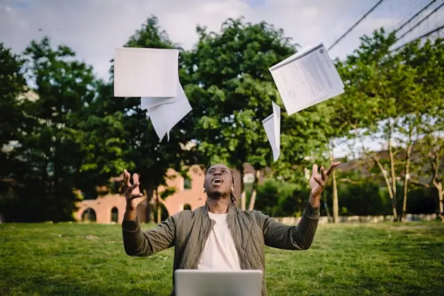 Man celebrating exam results