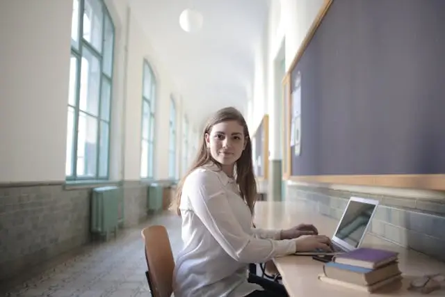 Girl studying on laptop